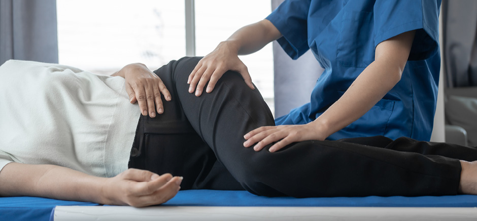 Orthopedic hip replacement recovery with patient on table.